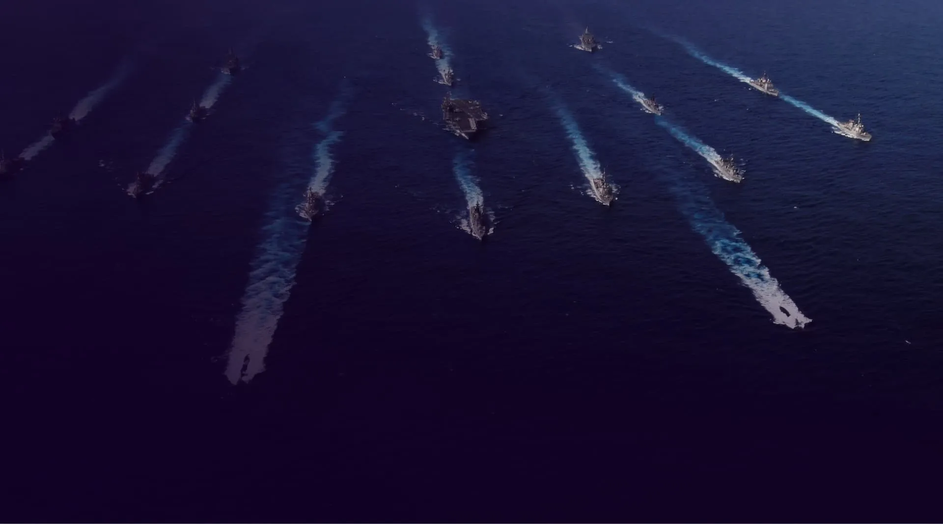 A naval formation underway at sea